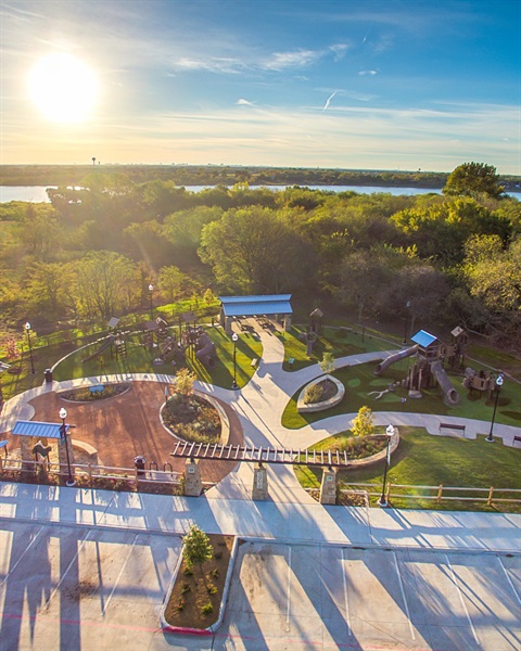 Drone shot of Beard Park with the sun setting behind the trees