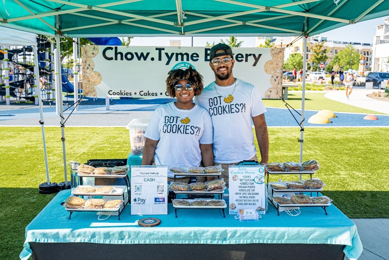 Two vendors selling cookies and bakery items.jpg